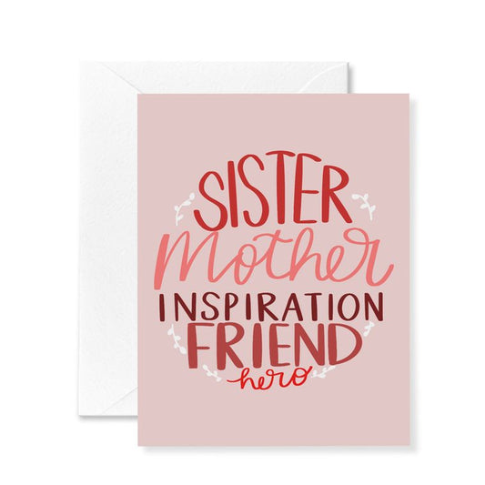 "Sister, mother, inspiration, friend, hero" pink and red greeting card text on a light pink background.